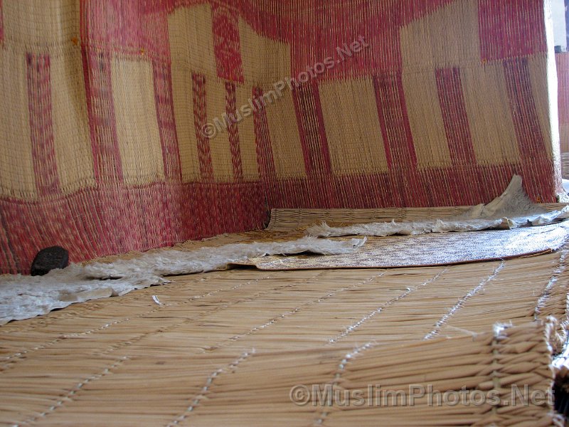 The floor of the Ben Youssef Mosque with its straw mats and lamb skin